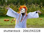 A young girl dressed in a Mari Lwyd Halloween costume