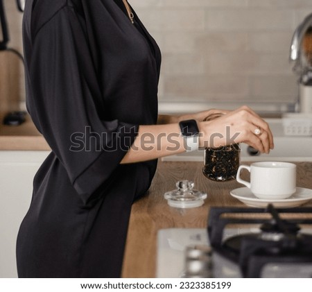 Young girl drinking tea in the morning