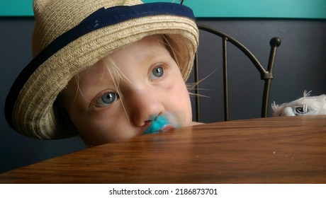 Young Girl Eating Bubble Gum Ice Cream With Stuffy