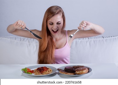 Young Girl Eating A Lot Of Food At Once