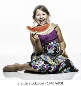 Young Girl Eating Watermellon