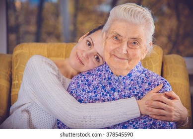 Young Girl Elderly Grandmother Girl Hugging Stock Photo 378545590 ...