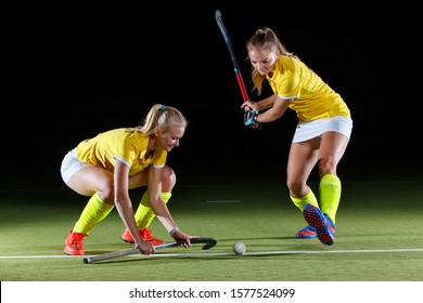 Young Girl Field Hockey Player Hit The Ball In Penalty Stroke.