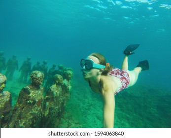 Young Girl Free Diving With Goggles And Pins In Grenada, Underwater Sculpture Park Of St. George's, Underwater Treasures In The Ocean