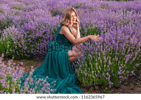 Similar – Woman posing in flower field with a handkerchief