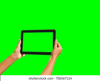 Young Girl Hand Holding A Tablet On Green Screen
