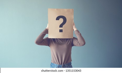 Young girl has Confused  Thinking  Question Mark Icon Paper Bag  copy space  