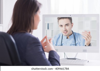 Young Girl Having An Online Consultation With Her Doctor