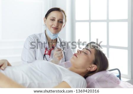 Similar – Female doctor comforting older patient