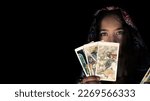 Young Girl in Headscarf Pose Holding Tarot Cards  Photo