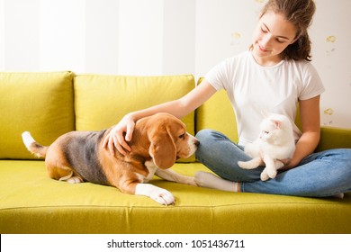 young girl with her pets - Powered by Shutterstock