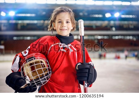 young girl hockey players in ice