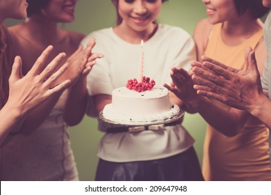 Young Girl Holding Birthday Cake