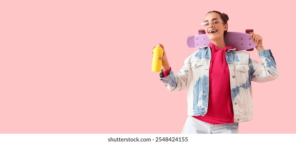 Young girl holding spray can and skateboard on pink background with space for text - Powered by Shutterstock