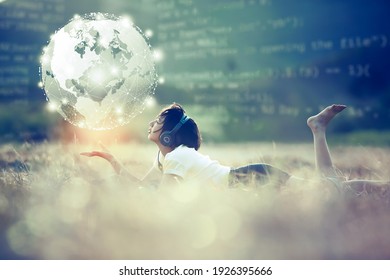 Young girl holding a virtual world with digital information and multimedia. Online learning during the COVID-19 pandemic. Future communication with digital multimedia concept. - Shutterstock ID 1926395666