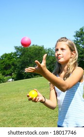 Young Girl Juggling