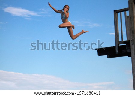 Similar – Image, Stock Photo Girl on jetty Joy Summer