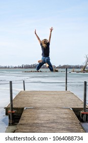 Young girl jumping with spring happiness