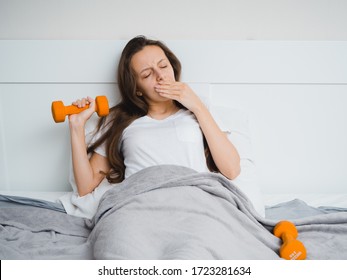 A Young Girl Is Lazy To Play Sports While Being At Home Because Of Quarantine. Fitness Laziness Concept, Overweight Set.