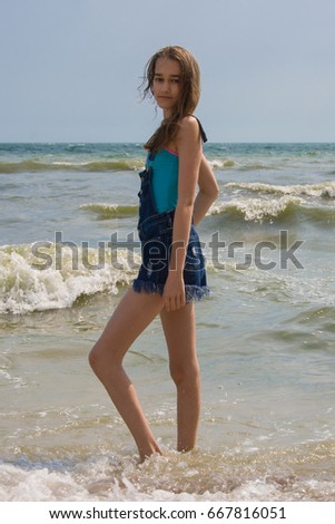 Similar – woman on the beach