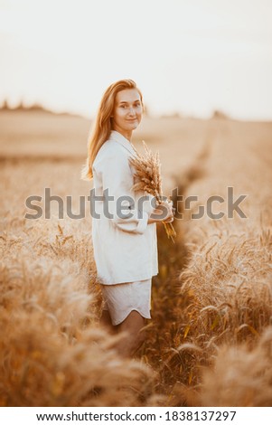 Similar – Image, Stock Photo laughing, blonde woman, sunset, field