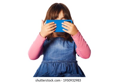 Young Girl Looking At The Cell Phone Obsessed Child Technology Addiction Concept. Hidden Face By The Mobile