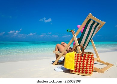 Young Girl Lying On Beach Lounger Stock Photo 311170217 | Shutterstock