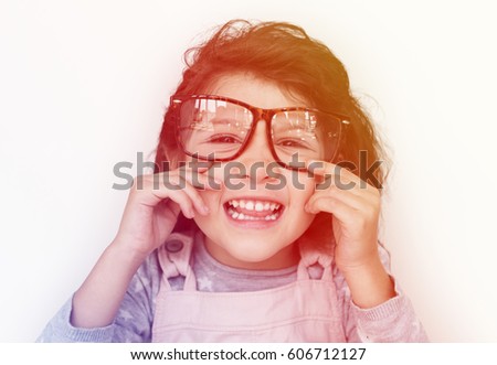 Young girl making facial expression