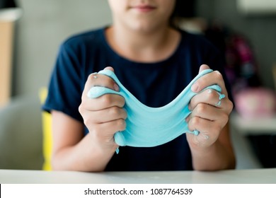 Young Girl Making A Slime