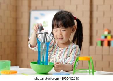 Young Girl Making Slime Ar Home