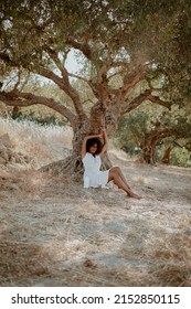 Young Girl On Safari Nature Drink Milk In Sundress And Hat. Afro Hair, Ecology, Health, Milk Bottle, Brunette, Afro Hair, Relaxation, Tranquility, Farm Products