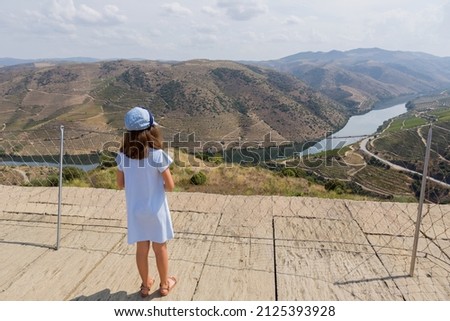 Young girl on the top of the Coa Museum in Vila Nova de Foz Coa. Archeological Museum of the Coa Valley. Portugal