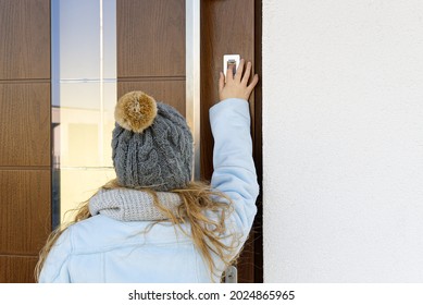 Young Girl Opening Door Using Biometric Fingerprint Scanner Lock To Open Home Door