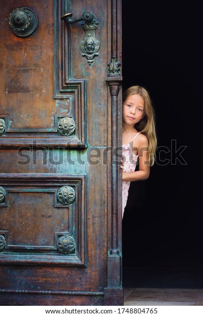 Young Girl Peeping Out Girl Behind Stock Photo Edit Now