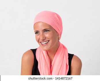 Young Girl With Pink Handkerchief On Her Head And White Background, Fighting Cancer