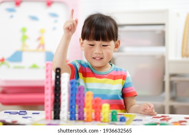 young girl play number blocks for home schooling  - Powered by Shutterstock