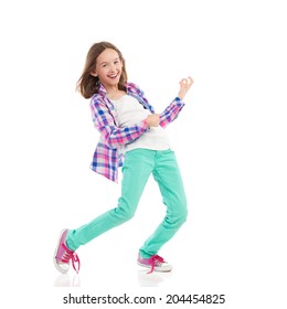 Young Girl Playing The Air Guitar. Full Length Studio Shot Isolated On White.