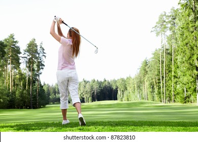 Young Girl Playing Golf