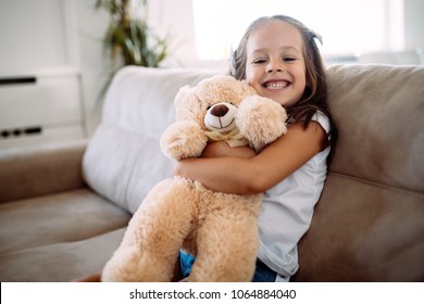 Young Girl Playing With Her Favourite Toy