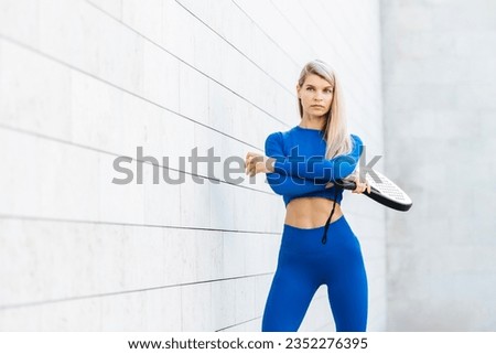 Young girl playing padel tennis. Professional sport concept. Horizontal sport theme poster, greeting cards, headers, website and app
