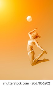 Young girl playing volleyball on the beach. Yellow color filter. Professional sport concept. Vertical sport poster, greeting cards, headers, website and app