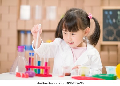 Young Girl Plays  Science Experiment For Home Schooling