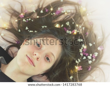 Similar – Teenage woman surrounded by confetti