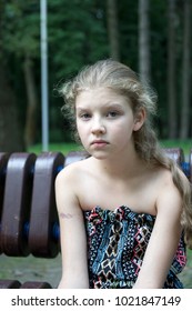 Young girl posing in park. Full frame image with copyspace. 