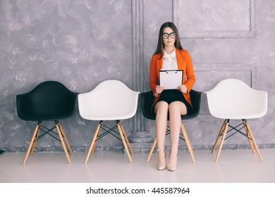 Young Girl Is Preparing For First Job Interview In Hall