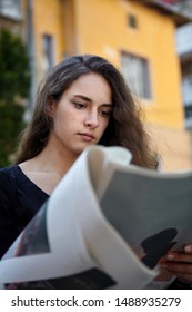 Young Girl Reading Newspaper Outdoors Yellow Stock Photo 1488935279 ...