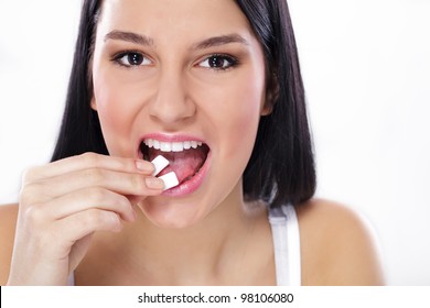  Young Girl Refreshing Breath With A Mint  Gum