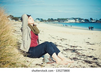 Young Girl Sitting On Beach Early Stock Photo 135273800 | Shutterstock