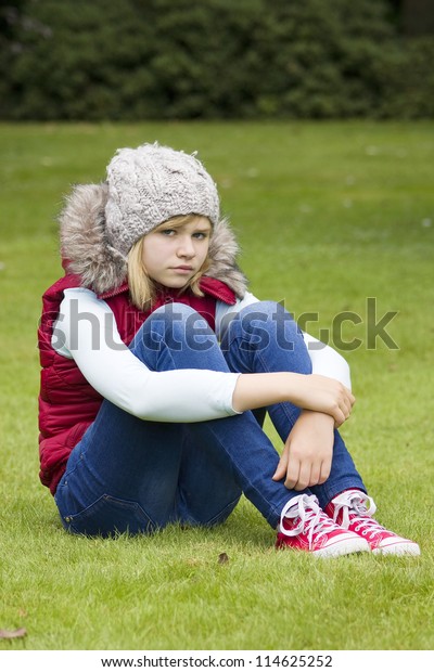 Young Girl Sitting On Grass Park Stock Photo 114625252 | Shutterstock