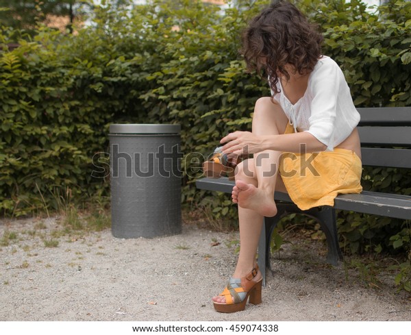 Young Girl Sitting On Park Bench Stock Image Download Now